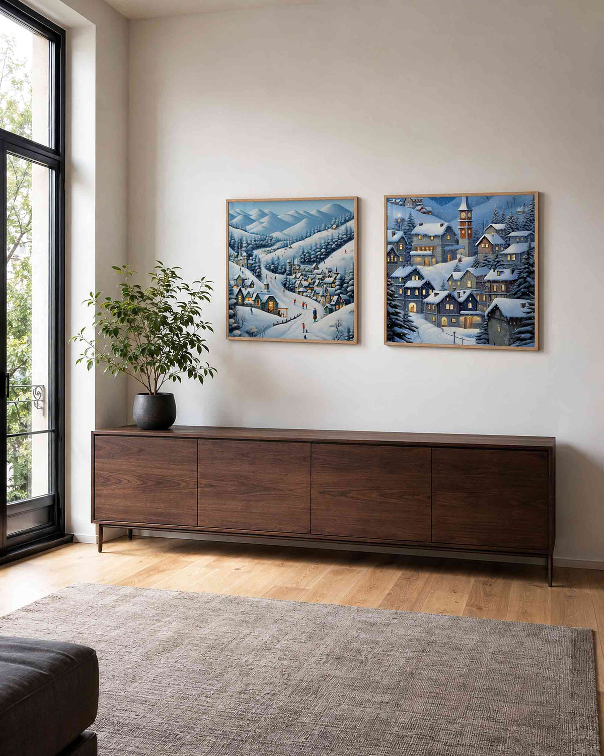 Interieurpresentatie van een tweedelige vierkante posterset met besneeuwd bergdorp