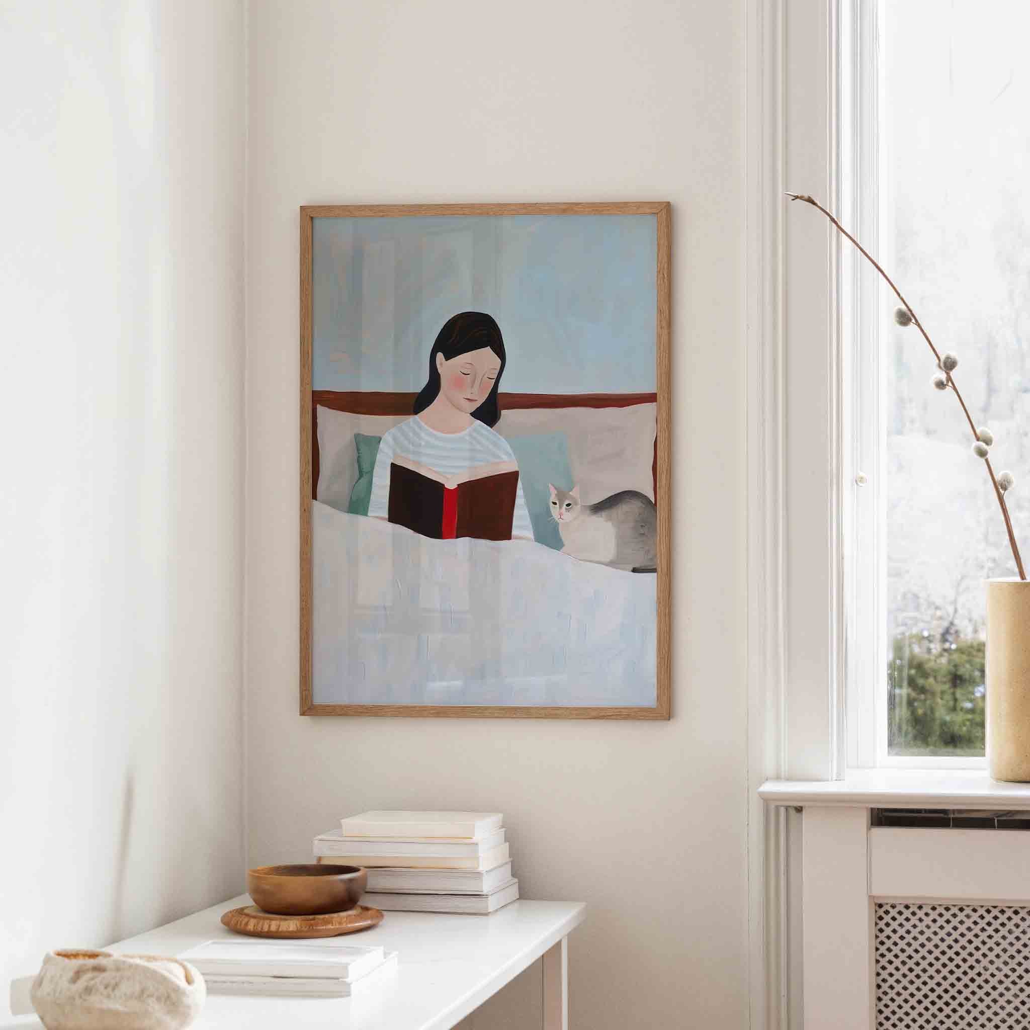 Lezende vrouw met kat Poster