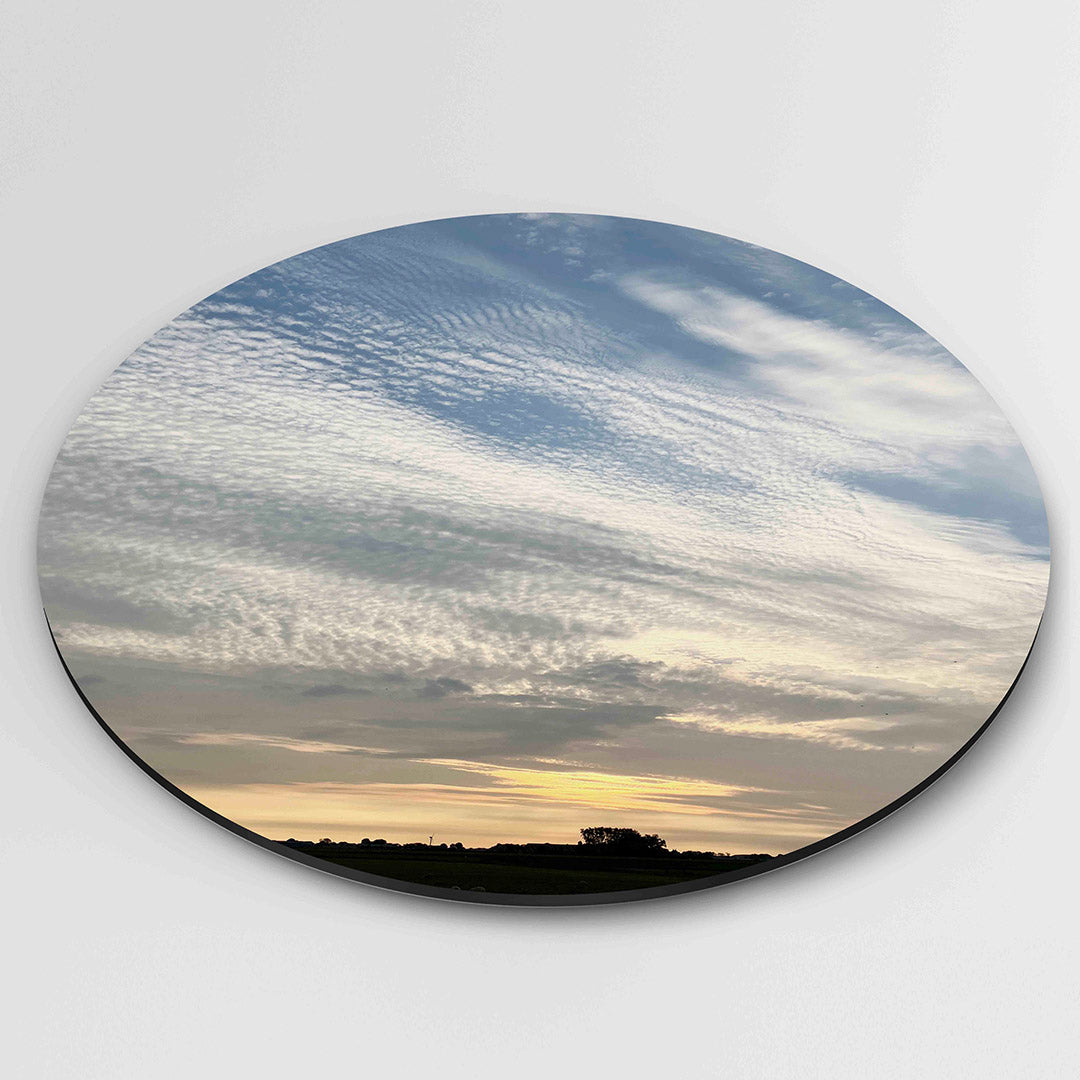 Wolkenspel bij zonsondergang Muurcirkel