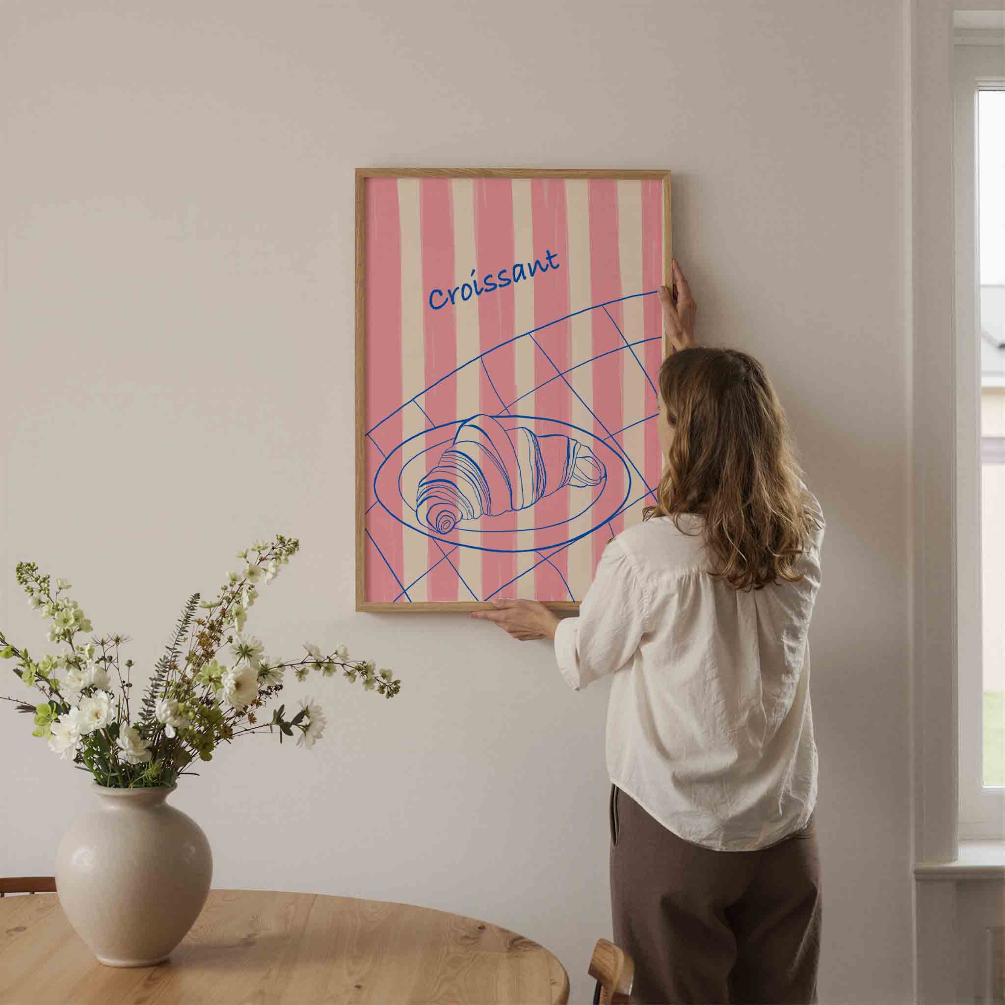 Croissant op bord Poster