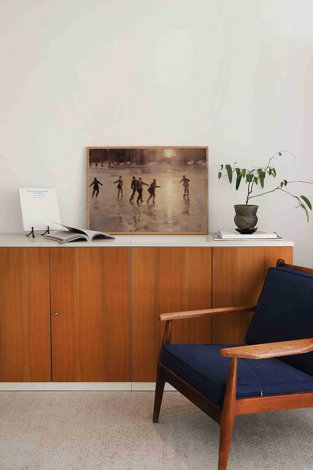 Schaatsers bij zonsondergang Poster