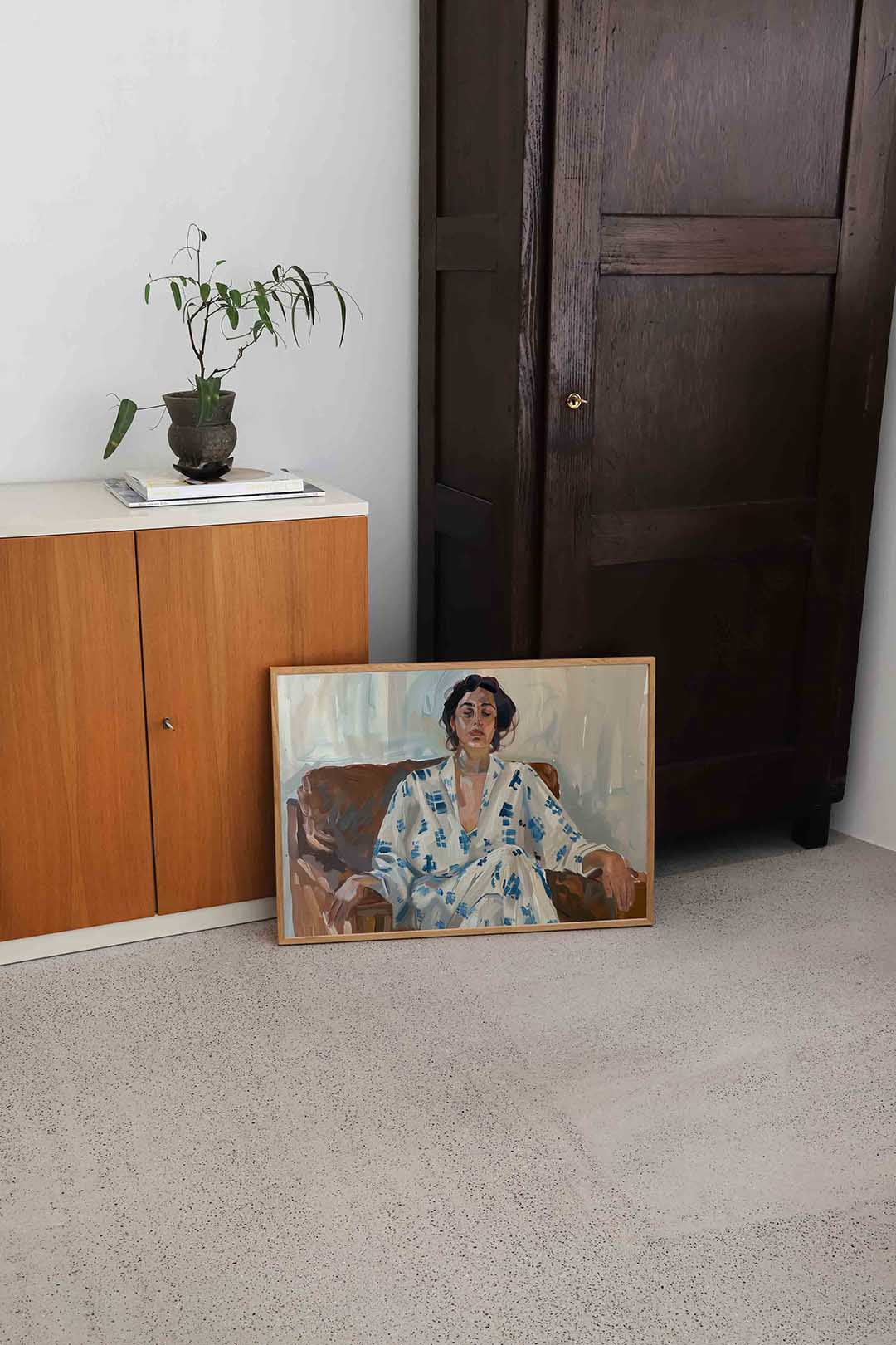 Vrouw in stoel Poster