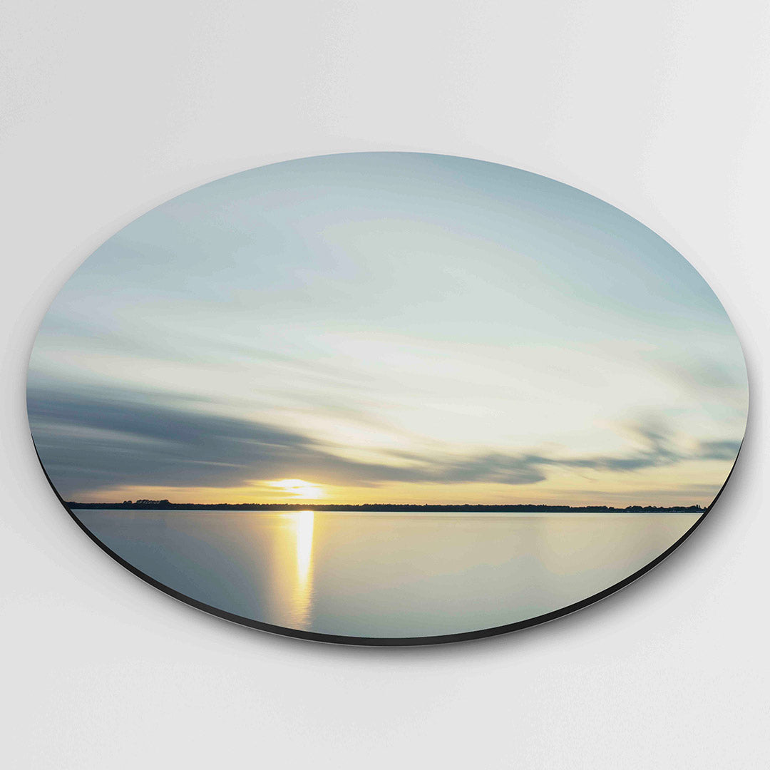Zonsondergang over kalm water Muurcirkel
