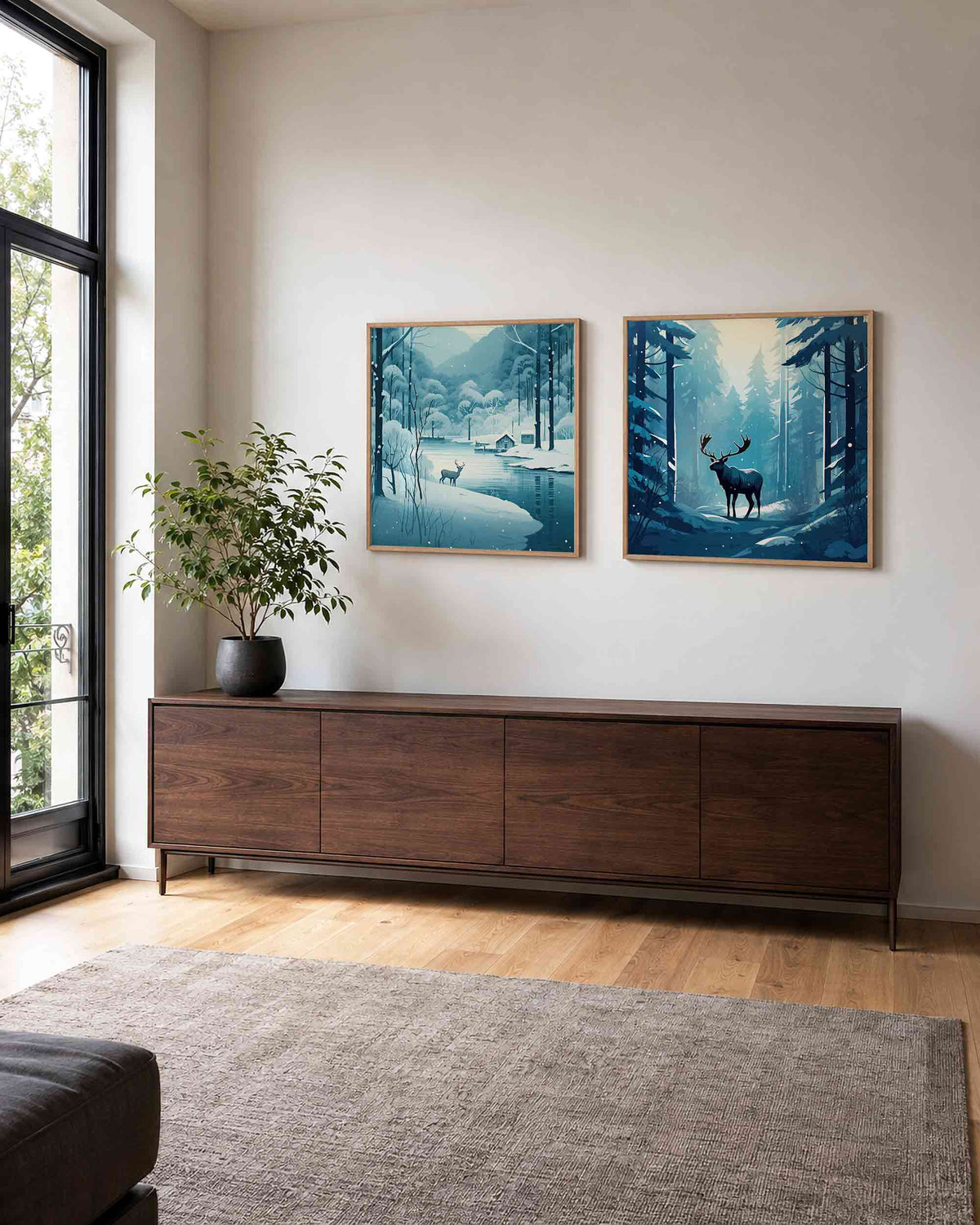 Interieurpresentatie van een tweedelige vierkante posterset met winterbos met herten