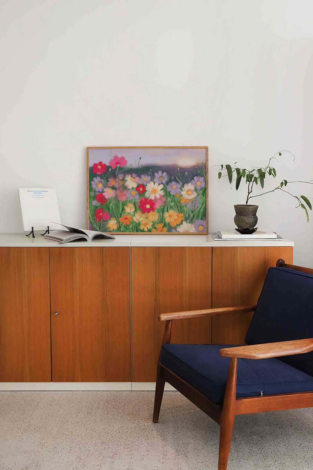 Bloemenveld bij zonsondergang Poster