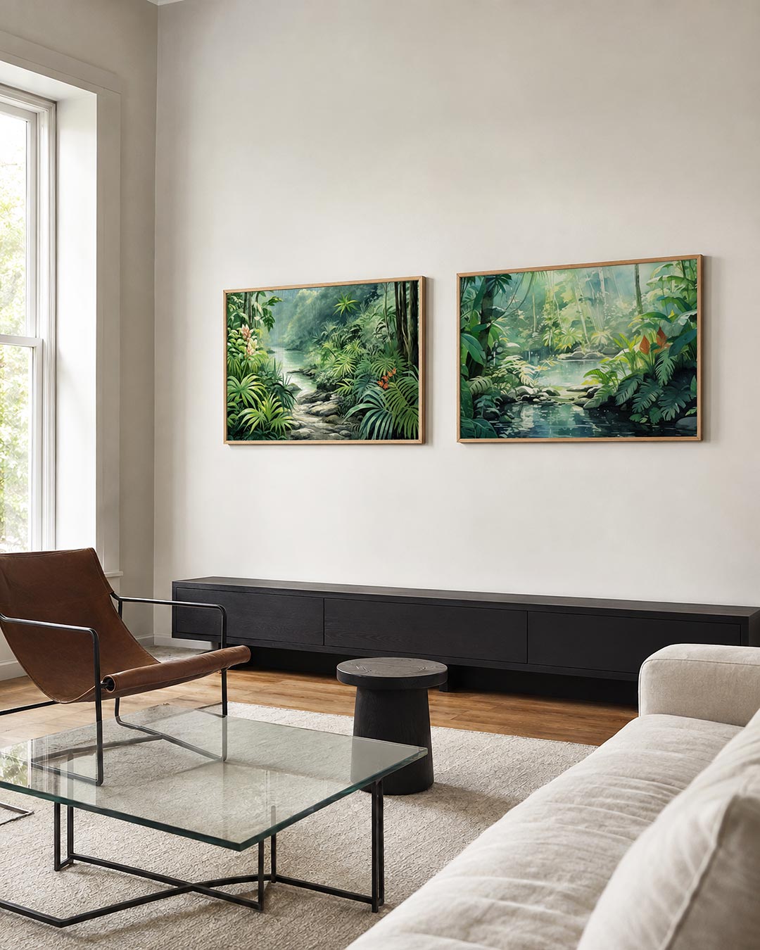 Twee liggende posters met bladeren en bloemen rond een rustige waterstroom, aan de muur in een interieur